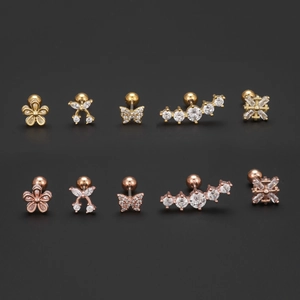 Boucles d'oreilles fleur en zircone or et or rose avec fermoirs à vis sécurisés et billes
