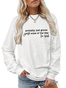 Close-up of text print on grey long sleeve crewneck sweatshirt for women's autumn style