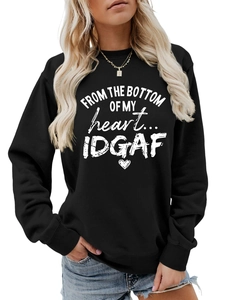 Detail of ribbed cuffs and white artistic letter printing on black cotton sweatshirt