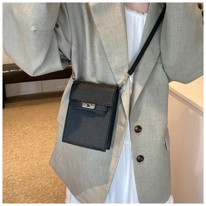 Chic black mini crossbody phone bag with classic silver turn-lock and leather texture