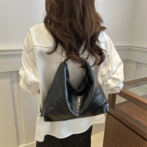 Large black patent PU leather hobo bag with embossed logo and metal chain strap