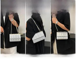 Detailed views of silver quilted chain bag shown as handbag, shoulder, and crossbody