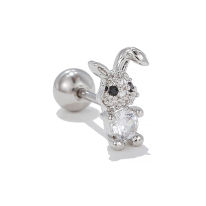 Close-up of rabbit cartilage earring with white zircon and stainless steel barbell back