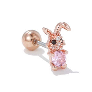 Macro detail of rose gold rabbit ear stud with pink zircon stone and ball back closure