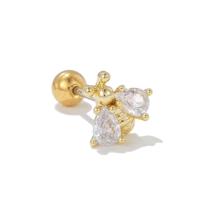 Detailed view of a gold bee cartilage stud earring with cubic zirconia and ball back
