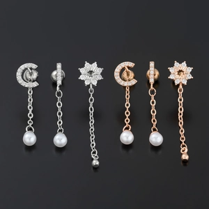 Boucles d'oreilles pampilles en acier avec croissant de lune, fleurs et perles