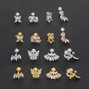 Lot de 16 piercings de cartilage en acier avec motifs de papillon et d'étoile en cristal