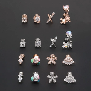 Set di 16 piercing per cartilagine in acciaio inox con cuori in zircone e orsetti