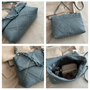 Detailed views of blue quilted denim crossbody bag with thick chain and interior space