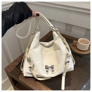 Sac fourre-tout beige en PU avec nœud métallique et anneaux décoratifs style décontracté