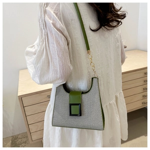 Retro colorblock green textured crossbody bag with gold chain strap on model