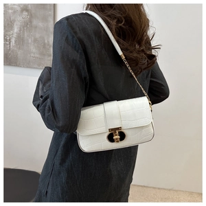 White crocodile pattern crossbody bag with gold chain and square metal clasp detail