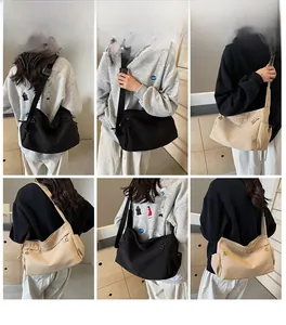 Detailed views of high-capacity Oxford fabric tote bags with adjustable wide straps