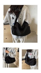 Detail of adjustable strap and side buckle on a black nylon crossbody dumpling bag