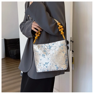 Elegant silk texture shoulder bucket bag with blue floral print and wooden bead handles