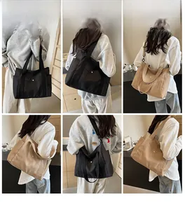 Detailed views of nylon crossbody tote bag in black and khaki showing on-shoulder fit