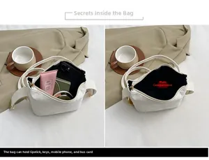 Detail view of large white PU leather handbag showing spacious interior and main compartment