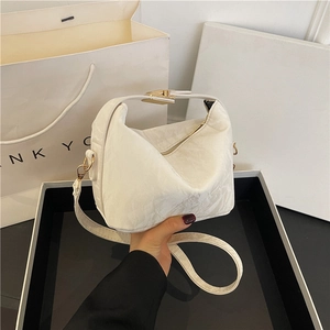 White ruched cloud handbag with gold buckle, features a detachable strap and soft PU texture
