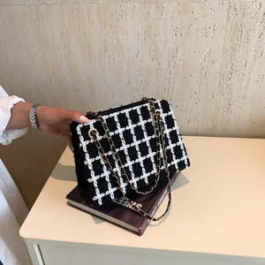 Classic black and white plaid tweed chain bag with gold metal shoulder strap for women