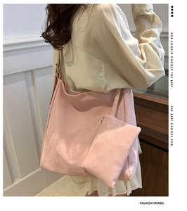 Detailed view of pink minimalist oversized tote bag set with soft matte suede texture
