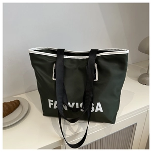 Large dark green Oxford cloth tote bag with shoulder straps and white logo for travel