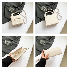 Detail shots of off-white crocodile embossed crossbody bag with gold hardware accents
