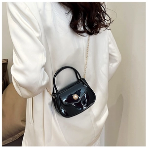 Mini vintage black patent leather handbag with pearl clasp and gold chain strap