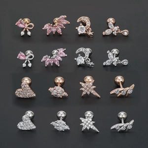 Set di orecchini a perno con fiocchi e cuori in zircone rosa finitura oro e argento