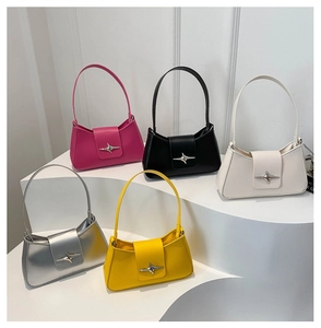 Detail view of stylish small square armpit bags with signature star buckles in five colors