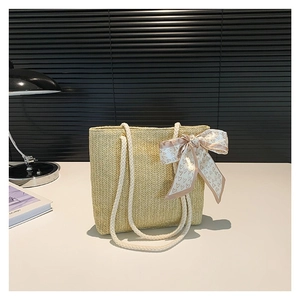 Straw shoulder tote bag with silk scarf bow and woven herringbone pattern bucket design