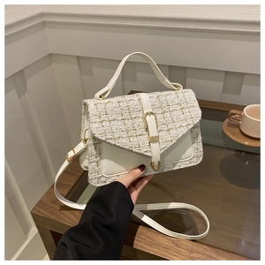Elegant white tweed handbag with gold accents and leather handle for women's fashion
