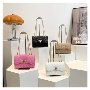 Quilted flap crossbody bags with golden V-shaped buckles in four stylish colors