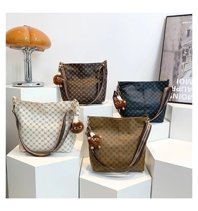 Detailed collection of vintage bucket bags with star patterns and wide striped straps