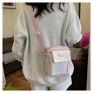 Sac bandoulière en toile bicolore violet et beige avec sangle réglable amovible
