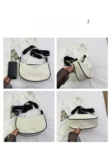Multiple views showing the details and structure of a white moon bag with black strap