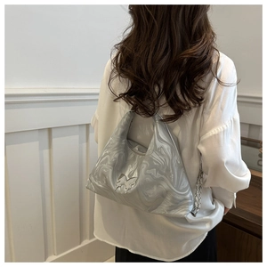 Detail of silver marble texture PU hobo bag with metal butterfly buckle and chain strap