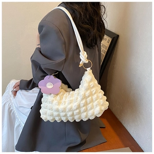 Soft white puff clouds bag with a purple flower pendant and knot rope shoulder strap