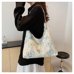 Borsa tote chic ricamata con farfalle, bordi sfrangiati e catena dorata da donna