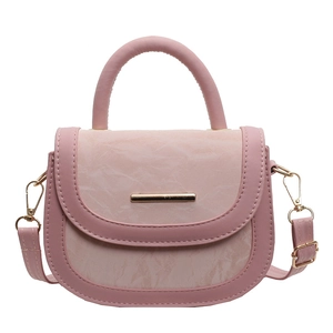 Pink semi-circle saddle bag with marble texture flap and gold metal hardware accents