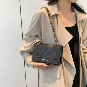 Classic black quilted chain shoulder bag for women with elegant gold strap detail