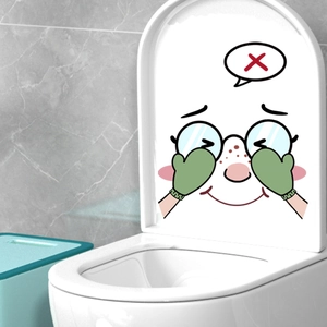 Detail of waterproof cartoon decal showing character covering eyes on toilet lid cover