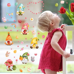 Detail of Easter gnome window clings with colorful eggs and rabbits for nursery decor