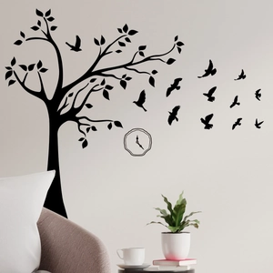 Black silhouette wall decal featuring a spreading tree, birds, and minimalist clock sticker