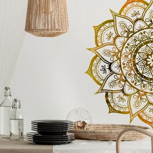 Macro detail of gold mandala wall decal in a minimalist bohemian style living room