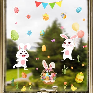 Close-up of Easter window stickers featuring bunnies, eggs, and flowers on glass surface