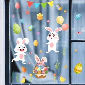 Detailed view of Easter rabbit, eggs and flowers wall decals on glass window decor