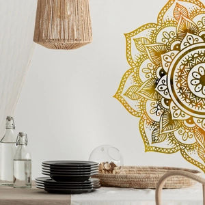 Detailed golden mandala wall sticker with intricate geometric patterns on a white wall decor