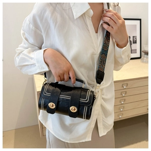 Black barrel bag with pearl trim and ethnic jacquard wide shoulder strap for women