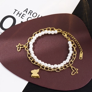 Double-layer gold stainless steel bracelet with butterfly charms and white pearls