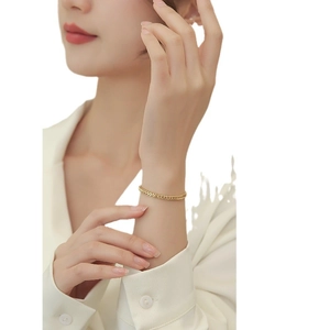 Elegant gold wheat-link titanium steel chain bracelet for women on wrist minimalist style